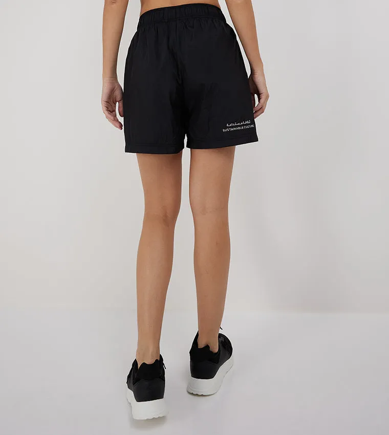 F5 MID-RISE NYLON SHORTS