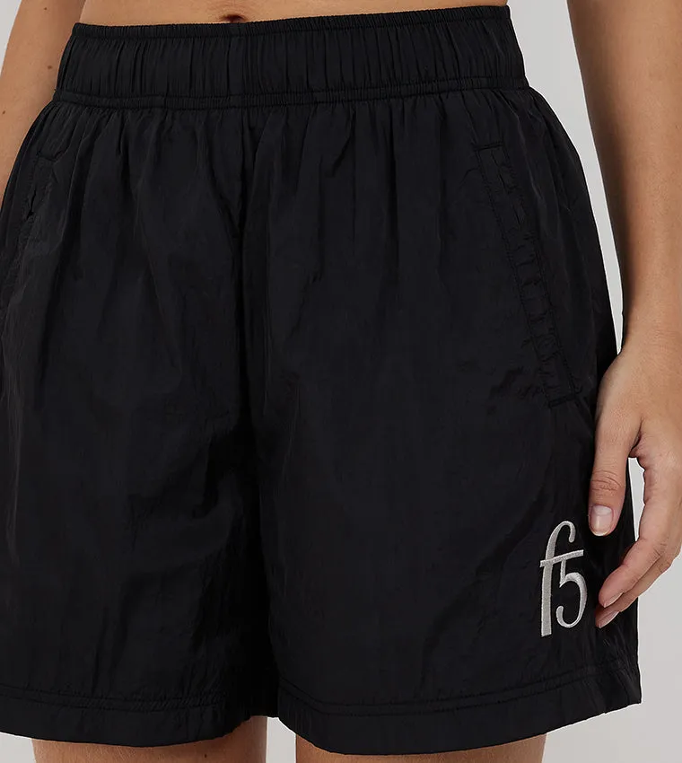 F5 MID-RISE NYLON SHORTS